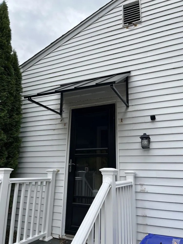 Affordable lawn care service for residential properties in Providence, RI by D & C Family