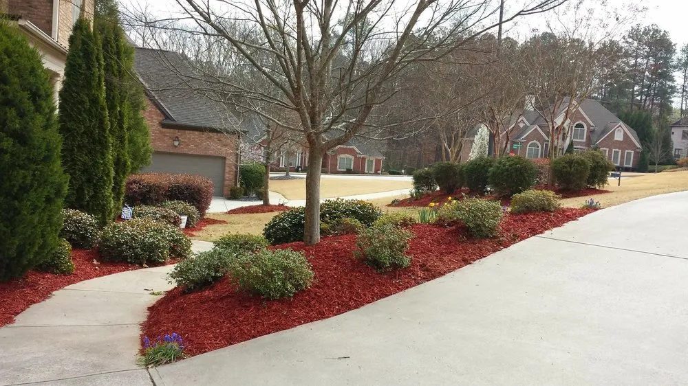 Custom yard cleanup service for year-round maintenance in Atlanta, GA by D & D Landscaping