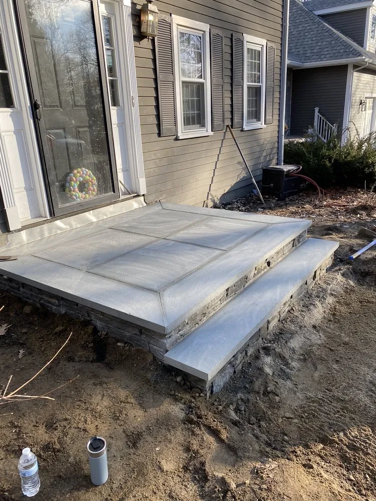 Reliable lawn mowing service for year-round maintenance across Wellesley Hills, MA - D & M Landscape and Construction