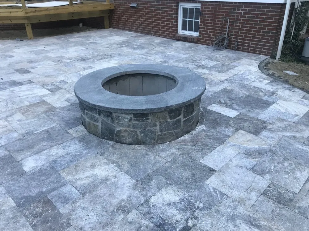 Affordable yard cleanup service for year-round maintenance in Wellesley Hills, MA by D & M Landscape and Construction