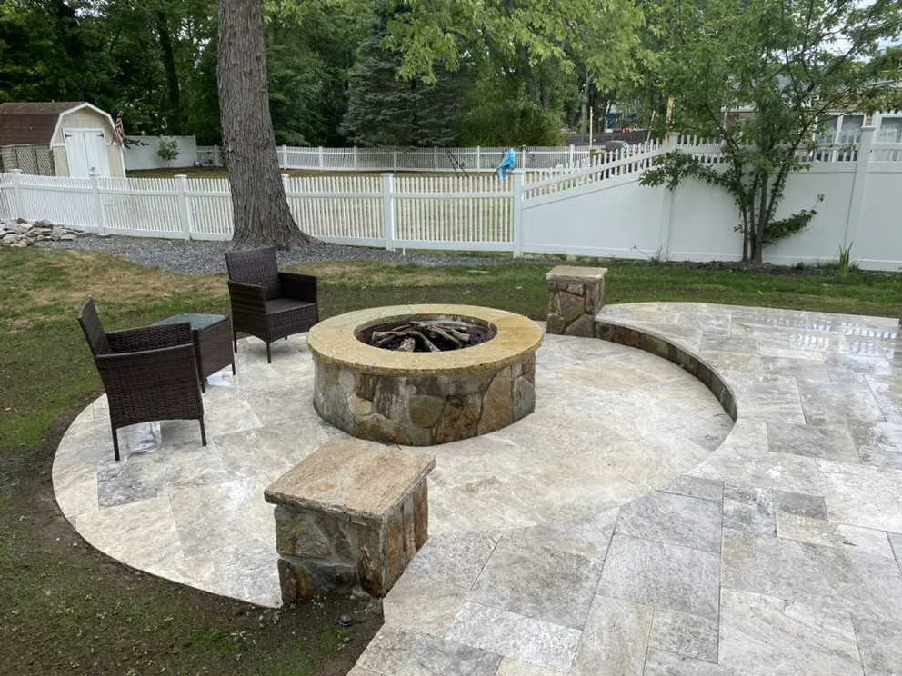 Professional lawn care service for year-round maintenance in Wellesley Hills, MA by D & M Landscape and Construction