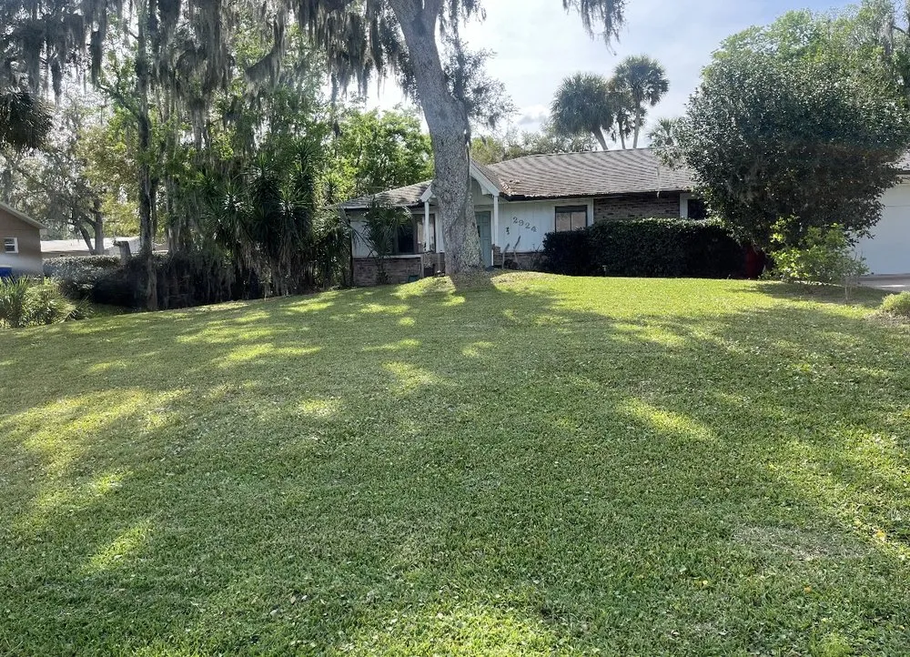 Professional yard maintenance for outdoor upgrades in Port Orange, FL by D & T Lawn And Landscape