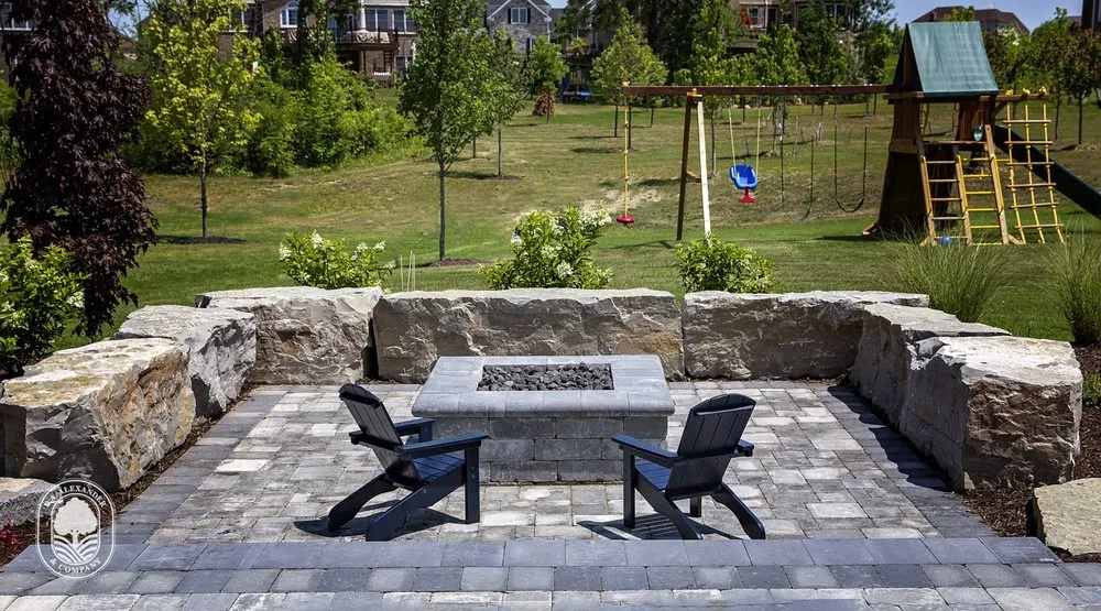 Custom landscape installation for year-round maintenance in Livonia, MI by DA Alexander & Company