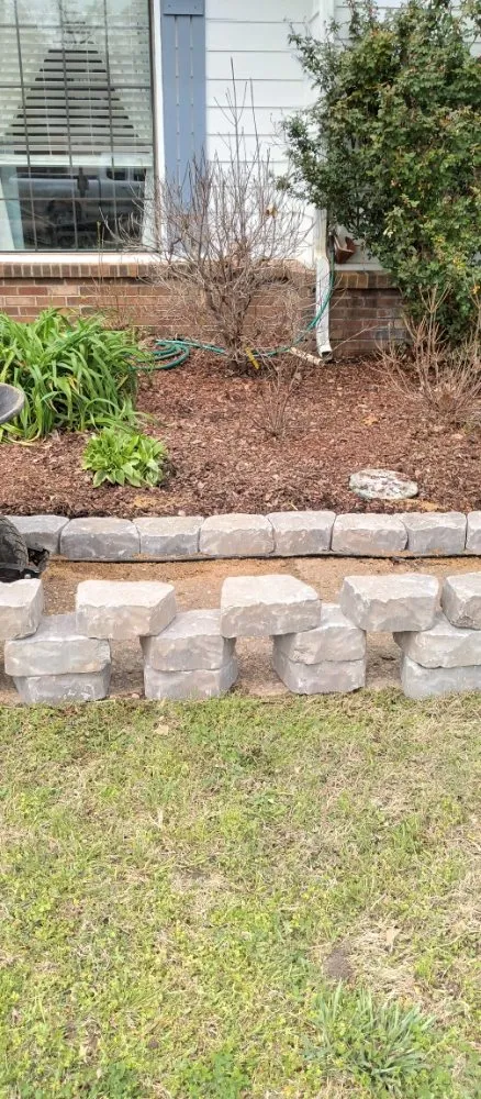 Custom yard cleanup service with custom design across Bartlett, TN - daddy daughter lawn services