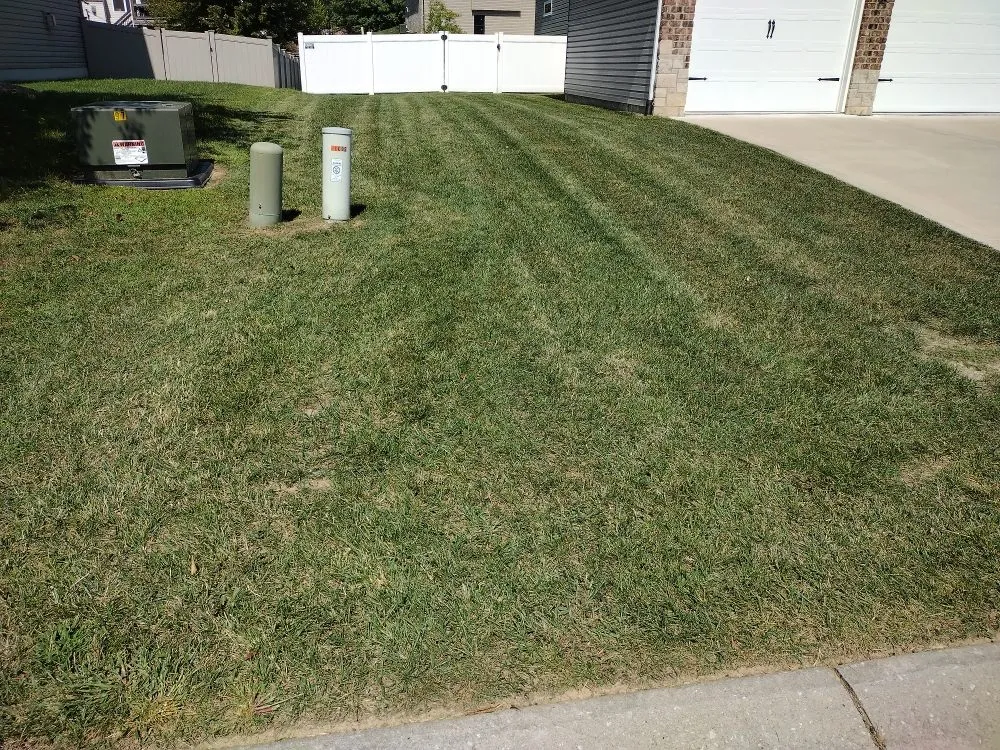 Local lawn mowing service with custom design across Granite City, IL - Dad's POV Lawn Care