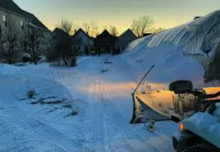 Custom landscape installation for residential properties in Faribault, MN by Dahlin Does It