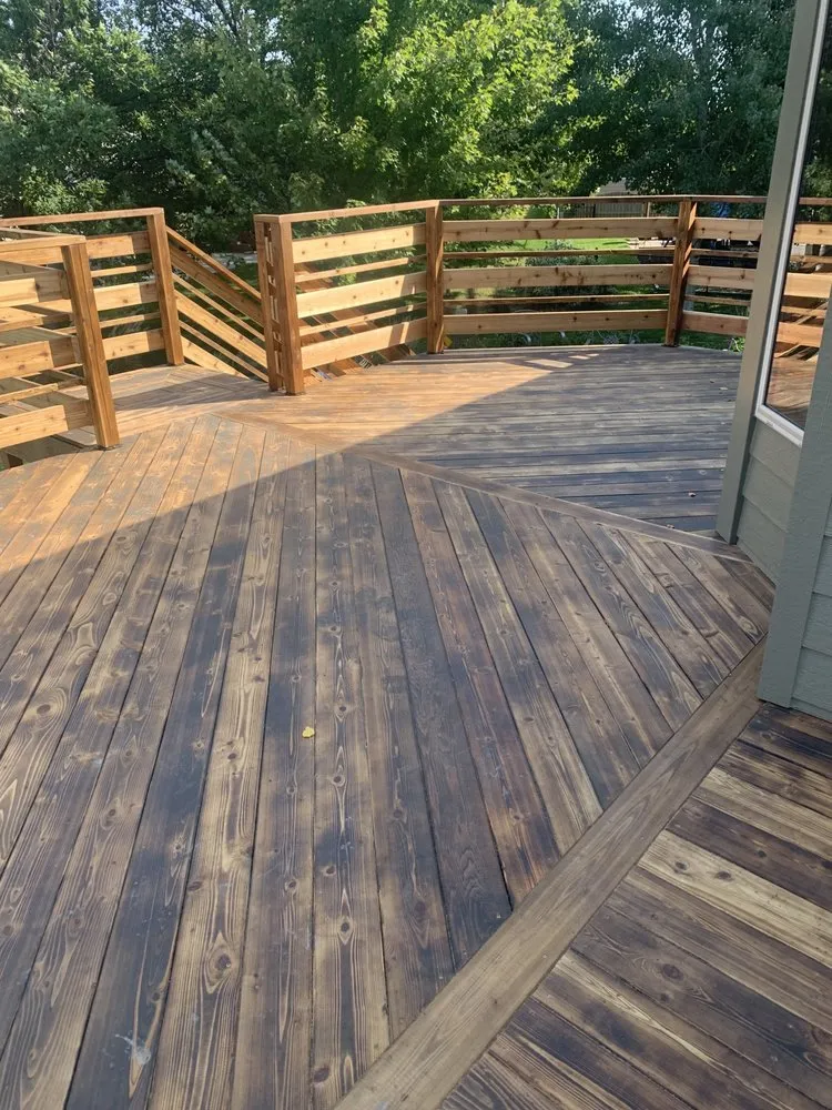 Local lawn mowing service for year-round maintenance in Sioux Falls, SD by Dakota Elevated Exteriors