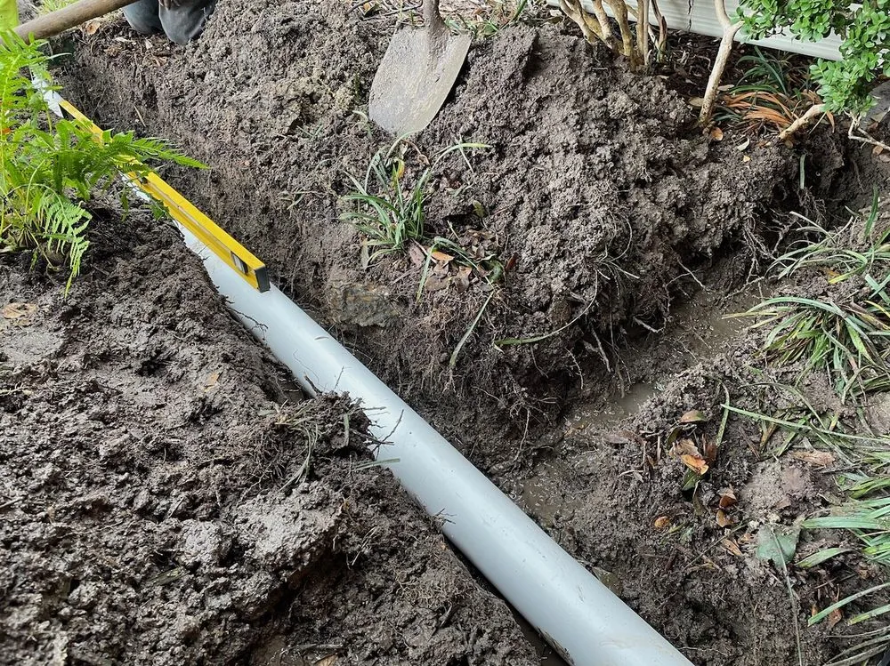 Professional landscape design for residential properties in Garland, TX by Dallas Drainage Pros