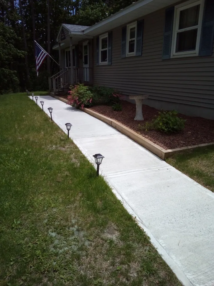 Professional lawn mowing service with custom design across Pittsfield, MA - Damasca Landscaping