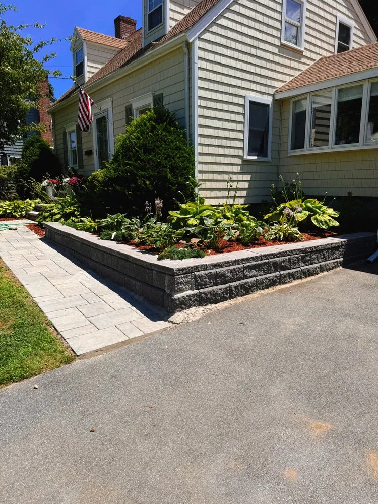 Custom yard maintenance for residential properties in Peabody, MA by D'Ambrossio Landscaping