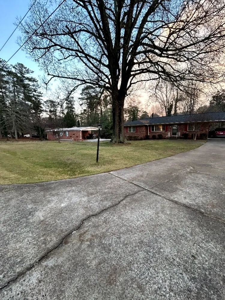 Affordable lawn mowing service for year-round maintenance in Marietta, GA by Daniel and Son Lawn Care Services