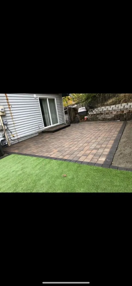 Expert yard cleanup service for year-round maintenance in Issaquah, WA by Danis Brick Paver & Landscaping