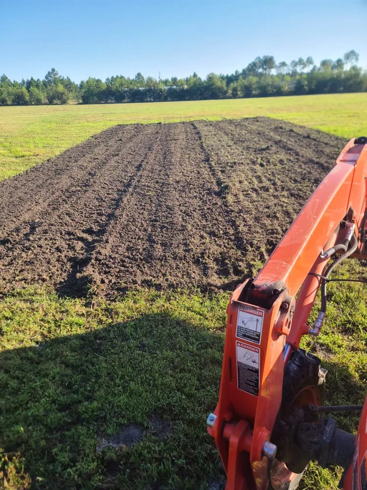 Top-rated yard cleanup service in Bay St. Louis, MS - Danos Lawn Service & Tractor Work