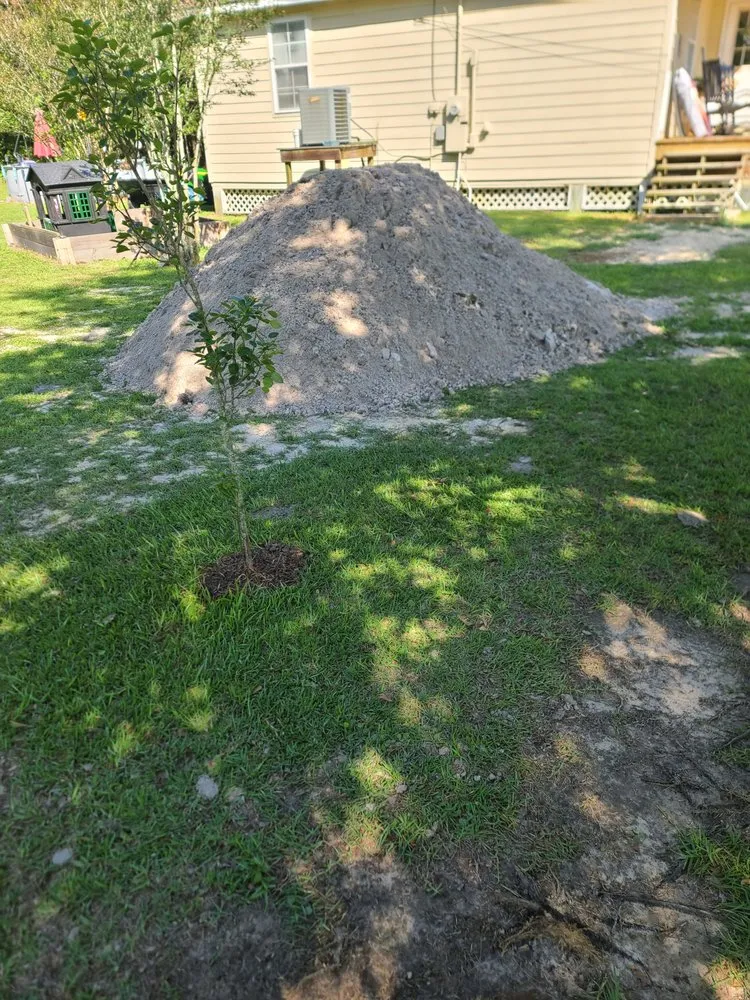 Custom garden landscaping for outdoor upgrades across Bay St. Louis, MS - Danos Lawn Service & Tractor Work