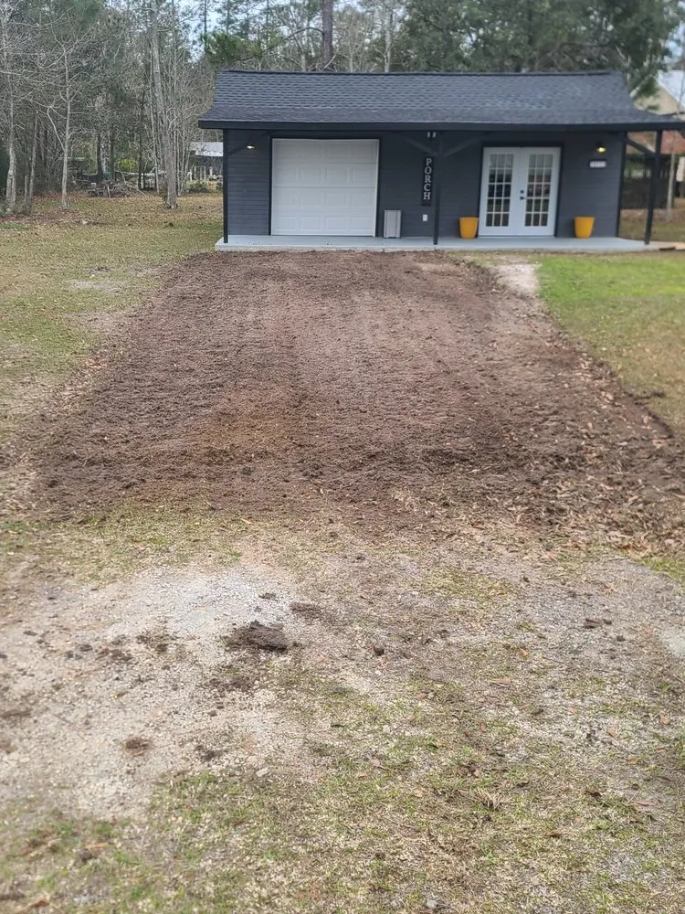 Custom yard maintenance for homes in Bay St. Louis, MS by Danos Lawn Service & Tractor Work