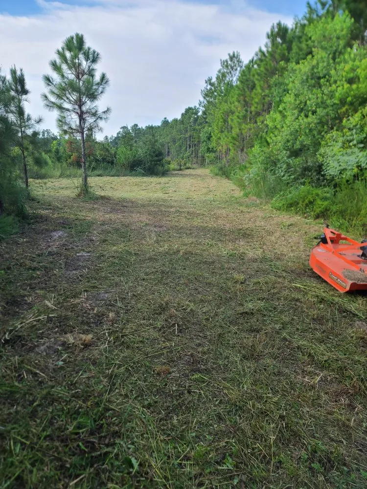 Trusted outdoor landscaping for residential properties in Bay St. Louis, MS by Danos Lawn Service & Tractor Work