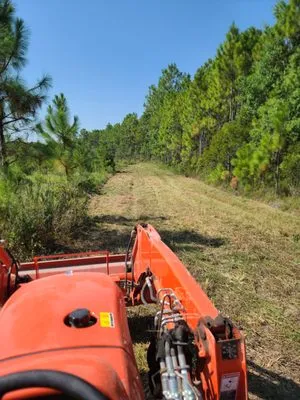 Danos Lawn Service & Tractor Work Logo