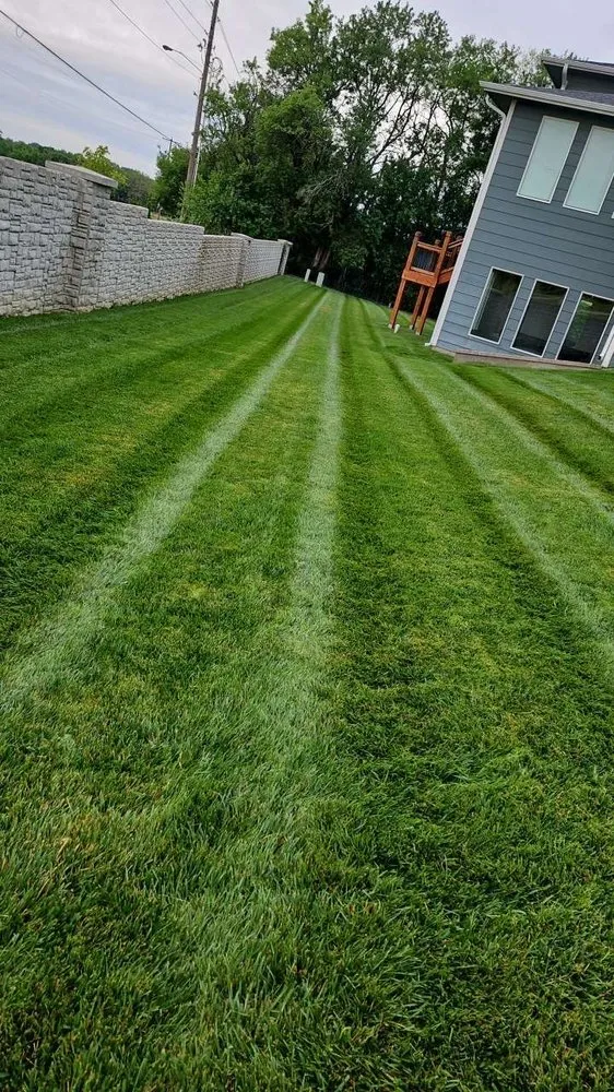 Expert landscaping services for residential properties in Wichita, KS by Dan’s Lawn And Fence