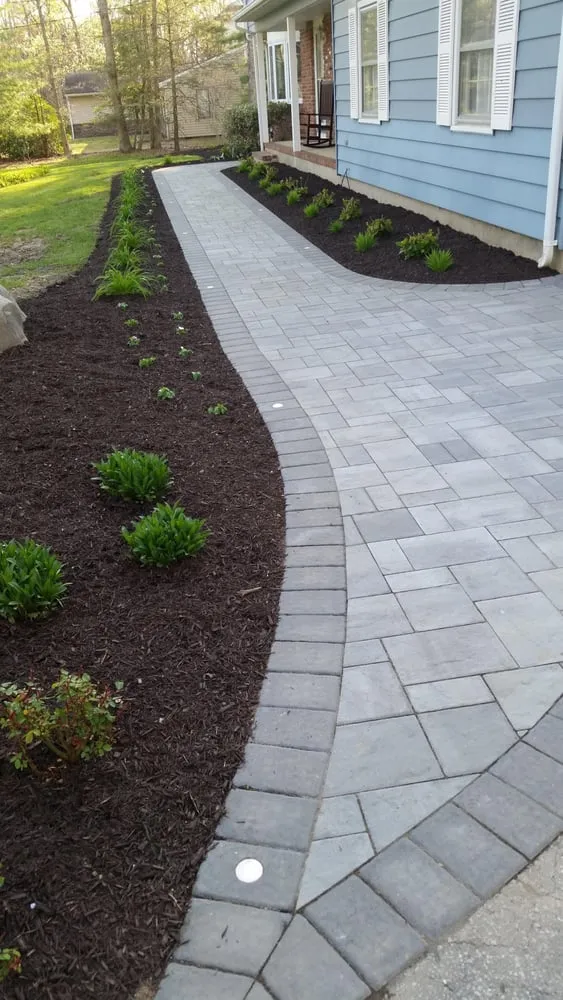 Custom yard cleanup service for year-round maintenance in Whiting, NJ by Danway Pavers