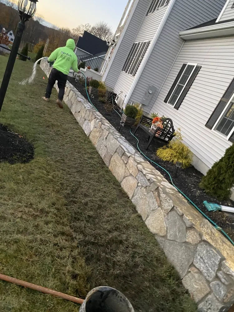 Local lawn mowing service in Milford, MA by Dardah Masonry and Landscaping