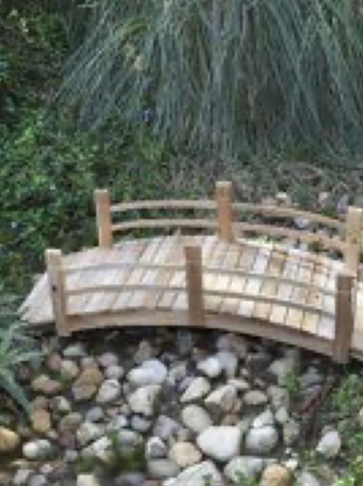 Custom garden landscaping with custom design in Milford, DE by Dark Green Lawn Service