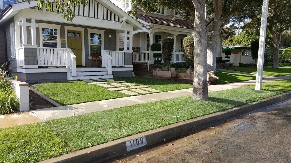 Affordable lawn mowing service for homes in Huntington Beach, CA by Dave and Sons Landscaping and Bobcat Services