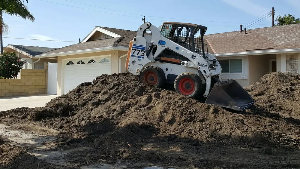 Reliable lawn mowing service with custom design in Huntington Beach, CA by Dave and Sons Landscaping and Bobcat Services