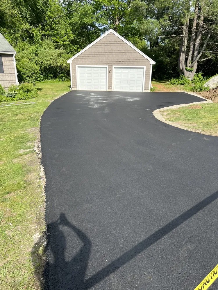 Trusted lawn care service in Fitchburg, MA by Davenport & Sons Paving