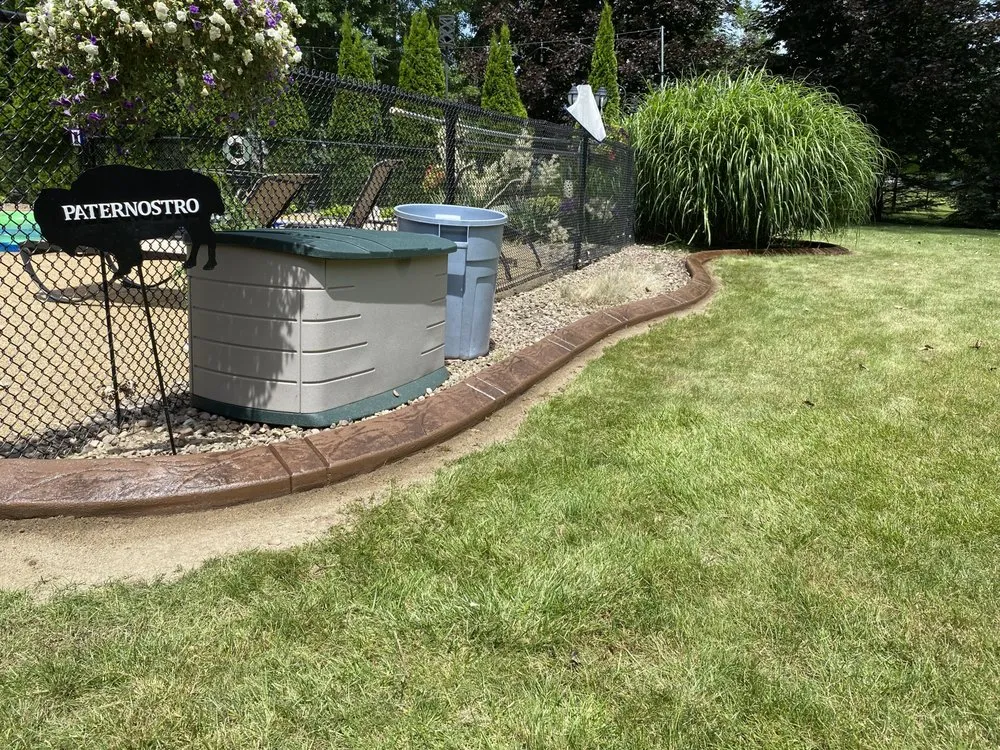 Custom yard maintenance for outdoor upgrades in Lockport, NY by Dave’s Decorative edging & Landscaping