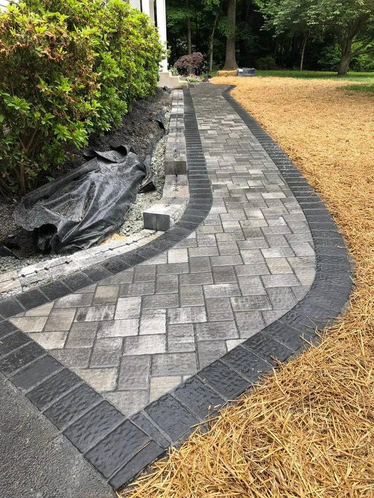 Custom outdoor landscaping in Highland Beach, MD by Dave’s Landscaping