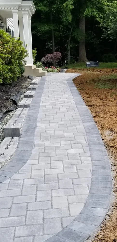 Custom lawn care service with custom design in Highland Beach, MD by Dave’s Landscaping