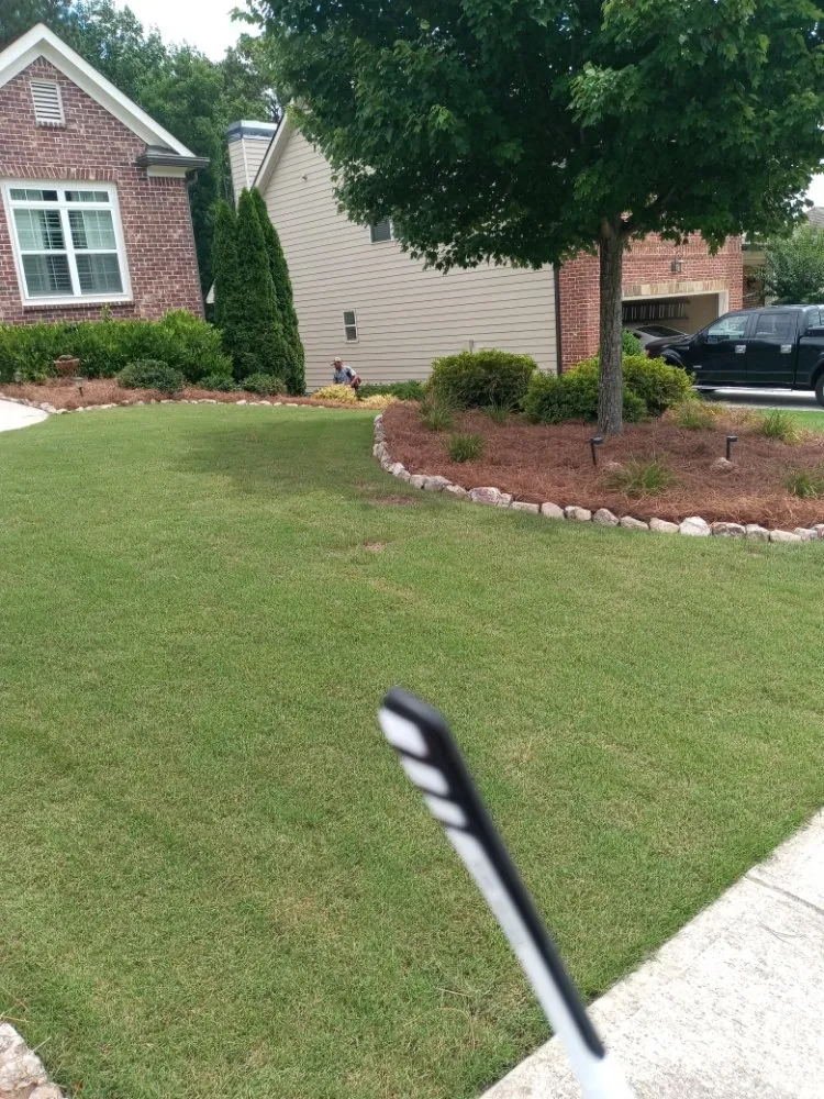 Professional garden landscaping with custom design in Jefferson, GA by David Sanders Pine straw And More