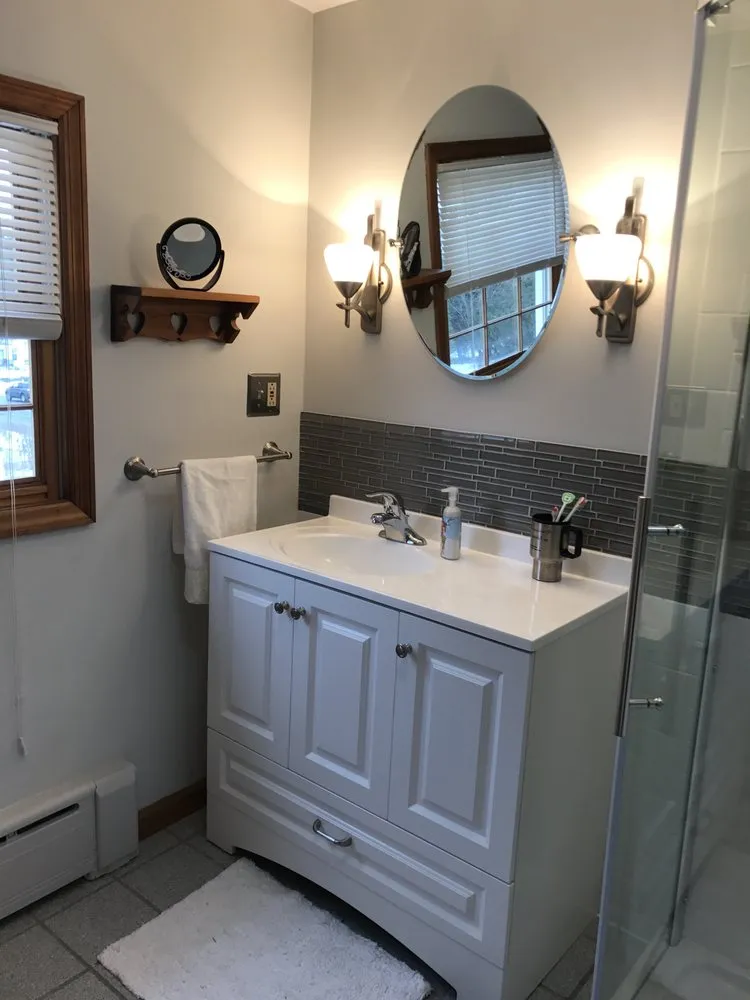 Local lawn care service with custom design in New York Mills, NY by David's Landscape & Construction