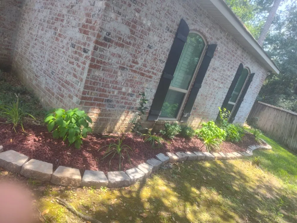 Custom yard maintenance with custom design in Metairie, LA by Davids Landscape Services