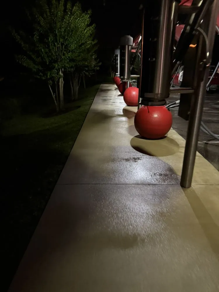 Custom lawn mowing service with custom design in Palm Bay, FL by Davis Curb Appeal Services