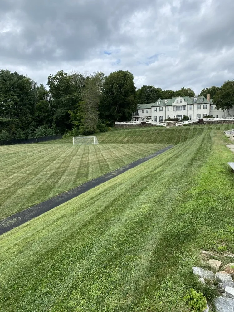 Trusted lawn mowing service for residential properties in Worcester, MA by Davis Landscaping