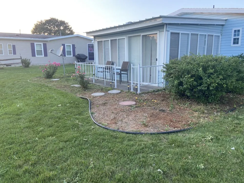 Professional lawn mowing service for outdoor upgrades across Lansing, MI - Davis Lawn Care