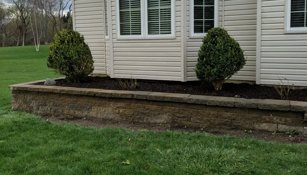 Custom landscape installation for outdoor upgrades in Holly, MI by Davisburg Design Landscaping