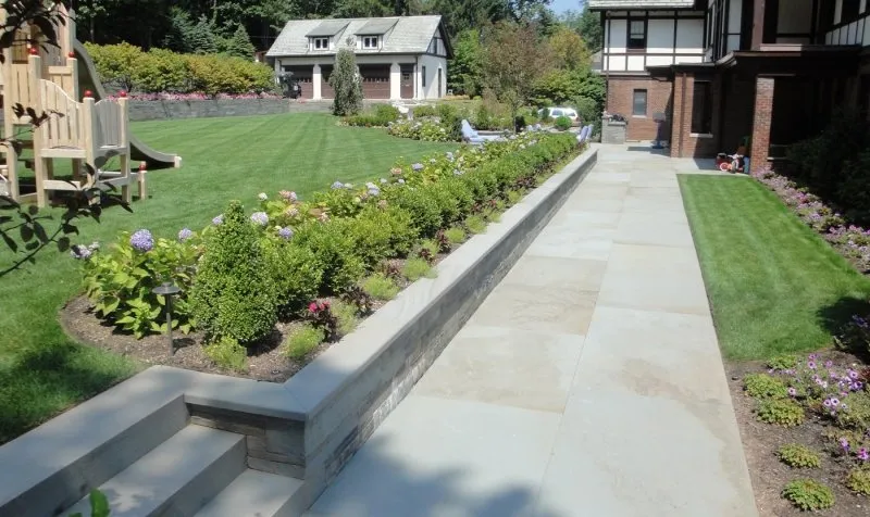 Expert lawn mowing service with custom design across Wolcott, CT - DB Landscape