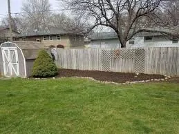 Custom outdoor landscaping with custom design in Council Bluffs, IA by DB Lawn Enforcement