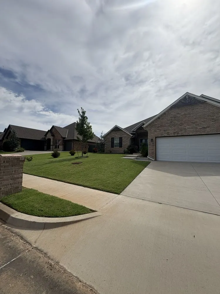 Affordable lawn mowing service for residential properties in Oklahoma City, OK by DC Landscapes