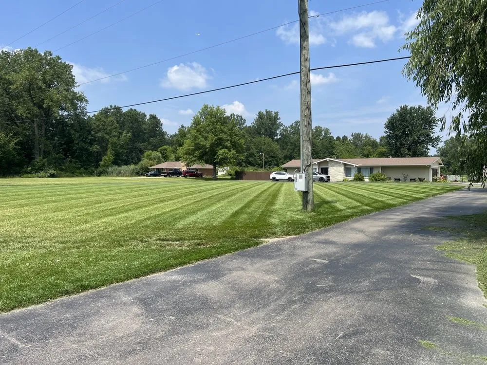 Custom lawn mowing service for residential properties in Belleville, MI by DC Lawn and Snow