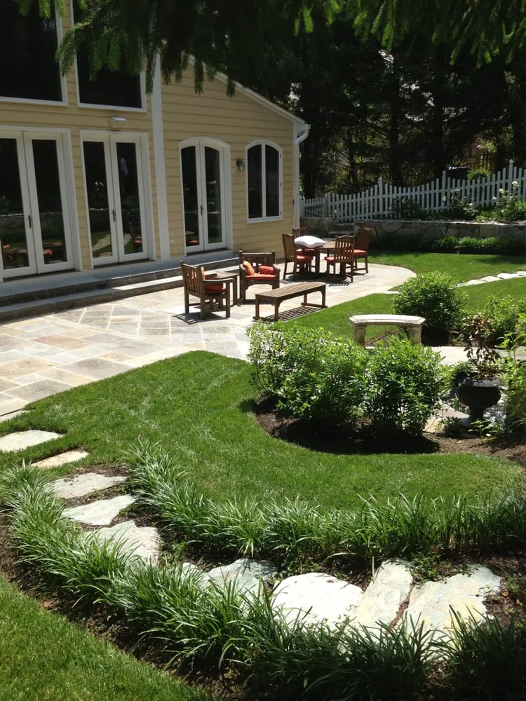 Custom outdoor landscaping with custom design in Hyattsville, MD by D&D Construction & Landscaping
