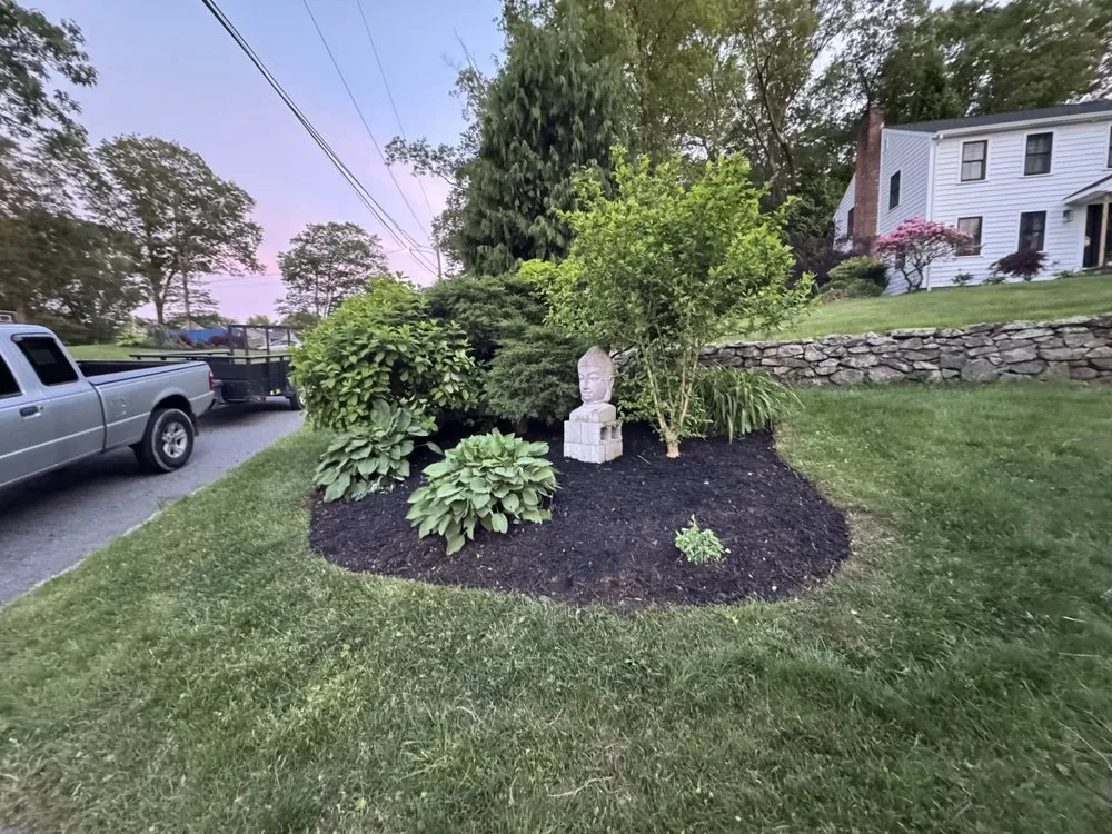 Professional lawn mowing service for year-round maintenance in Pawtucket, RI by D&D Yardmasters