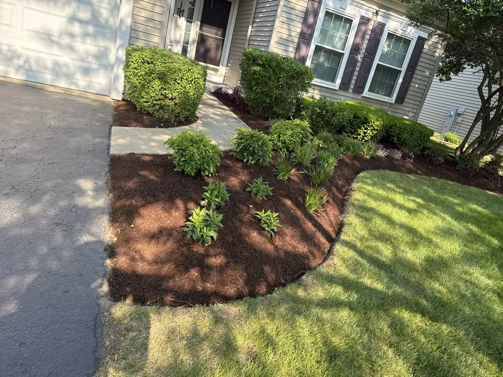 Affordable lawn care service for year-round maintenance in Aurora, IL by D&E Landscaping