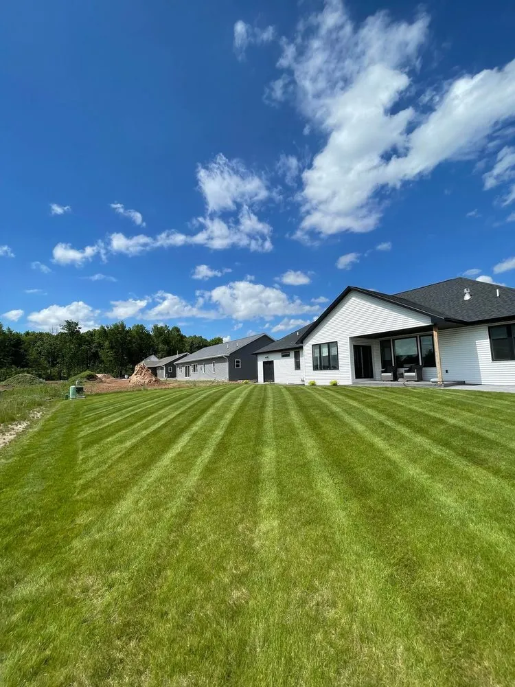 Local yard cleanup service for year-round maintenance in Appleton, WI by De Leon's All-Season Services