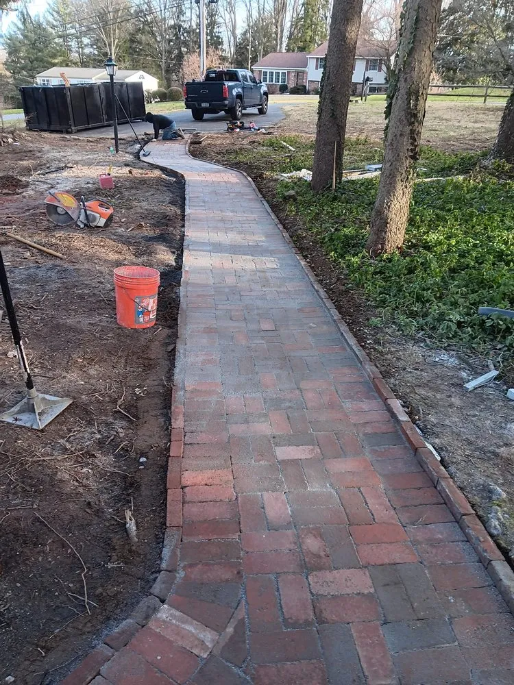 Expert lawn care service experts serving New Castle, DE - DE Masonry & Landscape