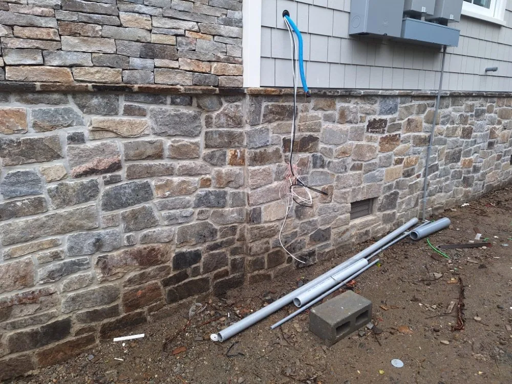 Custom landscape design for outdoor upgrades in Stamford, CT by De Masonry & Landscaping