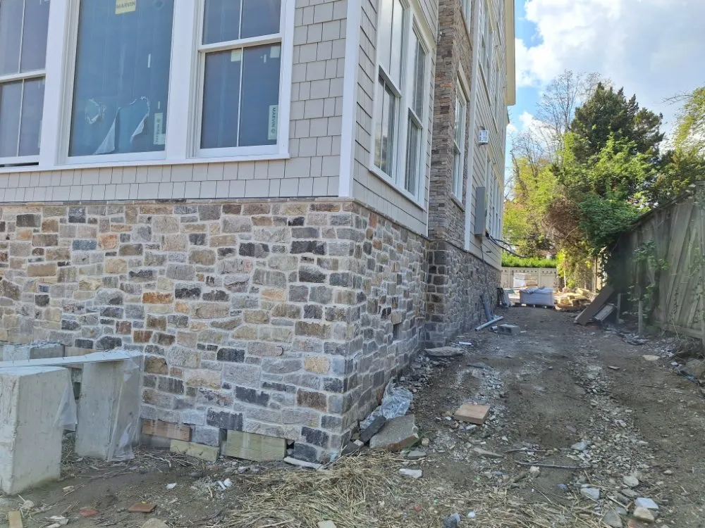 Custom lawn mowing service with custom design across Stamford, CT - De Masonry & Landscaping