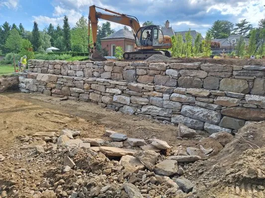 De Masonry & Landscaping Logo